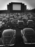 Cars Filling Lot at New Rancho Drive in Theater at Dusk Before the Start of the Feature Movie