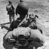 US Marine Jesse Goin Carrying His Dog Towards the Front During the Fighting on Kwajalein
