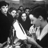 Women Watching Makeup Demonstration