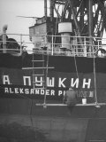 Man Painting Roman Alphabetized Translation of Russian Name