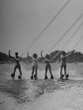 Four People Competing in the National Water Skiing Championship Tournament