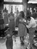 Designer Jack Glick Fitting a Strapless Bra on Model