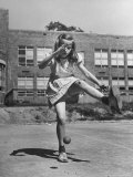 Girl Playing Stickball
