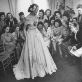 Young Woman Modeling the Lafaurie's Finished Product For the Tailors Before the Showing