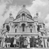 American Travelers Pausing on the Steps of the Sacre Coeur Church to View It's Beauty