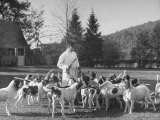 Man Standing with Group of Hounds at Rolling Rock Fox Hunt