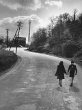 Boy and Girl Going on a Spring Hike Carrying the Usual Cider and Bread