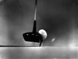 Close Up Shot of Driver Club Head Impacting Ball on Tee