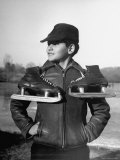 Close Up of Boy Carrying Ice Skates