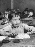 Close Up of Child in Second Grade Class Sitting at Desk