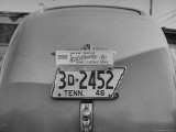 Close Up of Tennessee License Plate with Special Civic Booster Attached