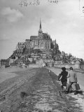 Couple Walking on Causeway Toward Mont Saint Michel
