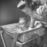 Woman Bathing Her Baby