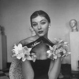 Model Wearing a Flowery Glove While Peering Into the Distance