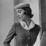 Model Wearing Tweed Suit and White Plush Hat