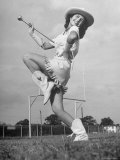 Kilgore Junior College Rangerette Marching with Her Baton