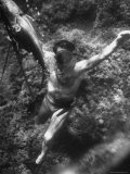 Man Spearing Fish Underwater