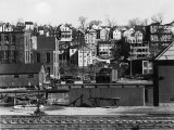 Houses Overlooking Railroad Tracks