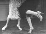 Charleston Dancers in Fringed Skirts Wearing Rhinestone Trimmed Pumps and Strapped Sandals