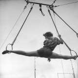 Student Circus Performer Gale Tomlinson Doing the Split on Rings