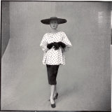 Fashion Model Showing Polka Dotted Smock Top over Black Skirt by Balenciaga