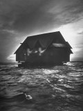 House Being Relocated by Water from Kennebunk Port to Goose Rocks Beach