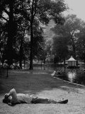 Man Lying on Ground in Park For Cool Place to Relax