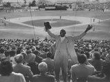 Enthusiastic Fan Cheering in Stands During Cuban Baseball Game