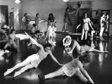 Coeds at the University of New Hampshire Performing Various Corrective Gymnasium Workouts
