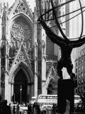 Entrance to St Patrick's Visible Across Fifth Avenue  with Atlas Statue Silhouetted in Foreground