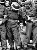 Little Girl Peering Out Between Soldiers Trying to Glimpse Royal Procession