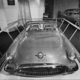 Sleek New Oldsmobile Starfire Standing in Show Room