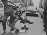 Boys Skateboarding in the Streets