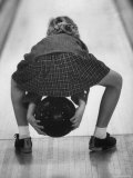Child Bowling at a Local Bowling Alley