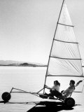Couple Sand Sailing