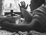 Boy Listening to Music on Phonograph in His Bedroom