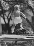 Baby Jumping on a Trampoline