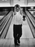 Child Bowling at a Local Bowling Alley