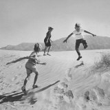 Children Playing in the Desert Sand