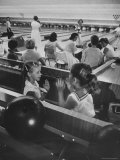 Children Entertaining Themselves While Their Mothers Compete in Bowling League