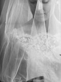 Double Ring Ceremony in Oakes  North Dakota  Bride is Putting Ring on Groom's Finger