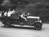 Kids Riding on Back of Old Fire Engine