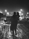 Man Helping a Girl Across the Street