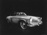 Man Sitting in the 1953 Starliner Studebaker Which is Capable Of Taking Sharp Curves at High Speed