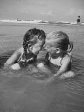 Little Girls Playing Together on a Beach