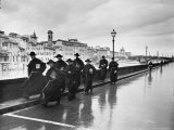 Monks Walking Along the River Arno