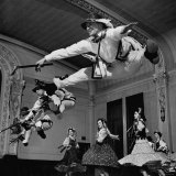 Walter Karcz Leaping in Air as Fellow Members of Amateur Dance Group Practice the Gorlaski