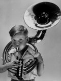 Child Playing Musical Instrument