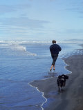 Presidential Candidate Bobby Kennedy and His Dog  Freckles  Running on an Oregon Beach