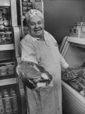 Grocer EG Guthart Displaying One of His Steaks
